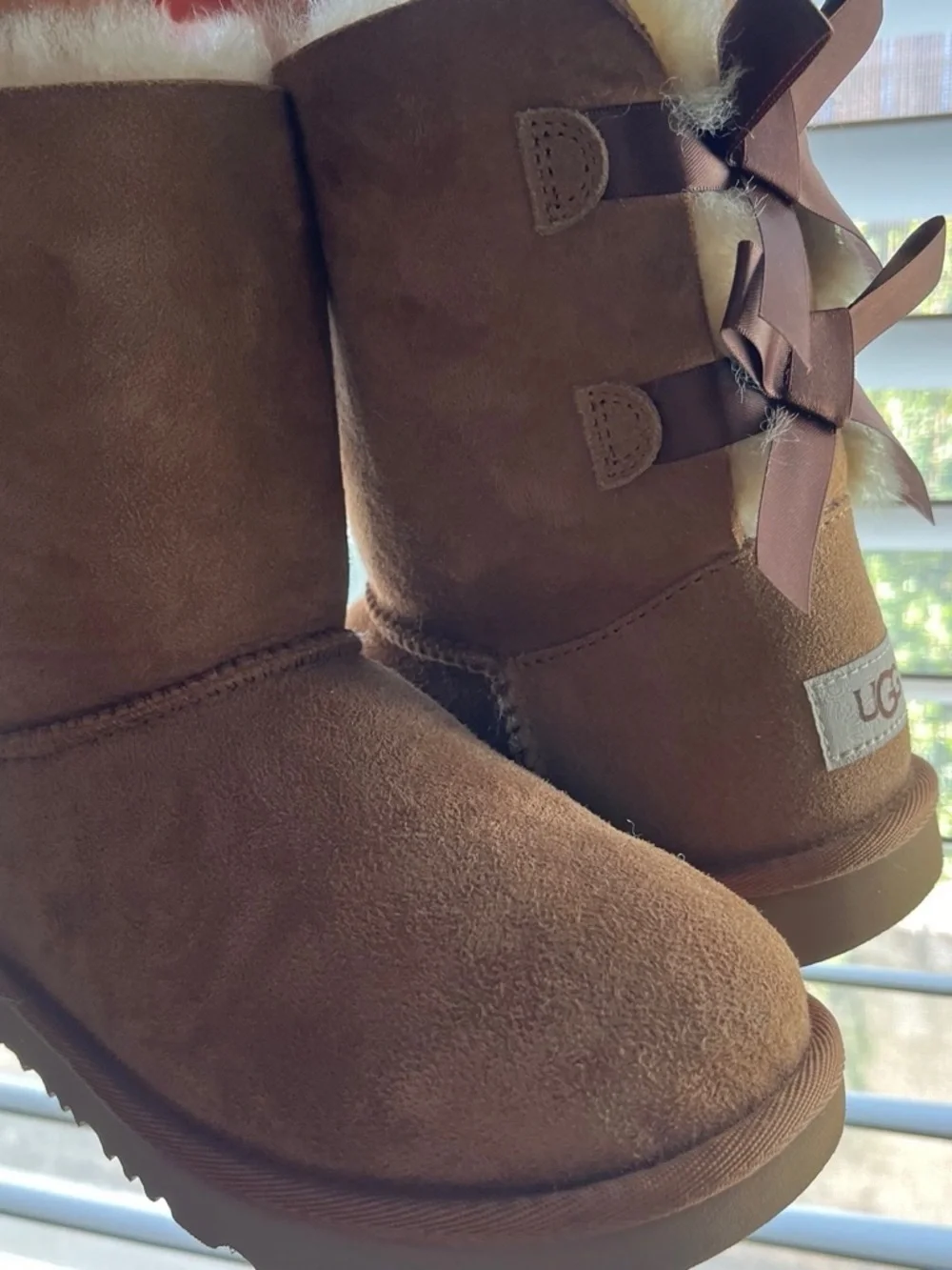 UGG Kids Brown Suede Bow Back Boots Like new .